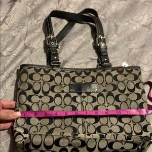 Black coach purse w/ front picket